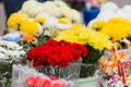 A bouquet of red carnations and other flowers are sold in the city market Royalty Free Stock Photo