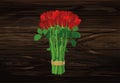 Bouquet of red flowers. Roses tied with a rope. Greeting card fo