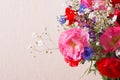 Bouquet of red and pink poppy and blue cornflower on light background. Summer flowers background.