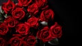 Bouquet of red roses on a black background, top view Royalty Free Stock Photo