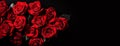 Bouquet of red roses on a black background, top view with copy space Royalty Free Stock Photo