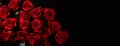 Bouquet of red roses on a black background, top view with copy space Royalty Free Stock Photo