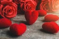 Red roses, red heart shape on a wooden table Royalty Free Stock Photo