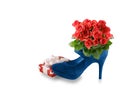Bouquet of red roses in a high-heeled blue shoe isolated on white Royalty Free Stock Photo