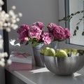 Bouquet of red roses in a tin bucket, a steel bowl with green apples and a pink box with the inscription Best wishes on a stone Royalty Free Stock Photo