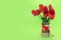 Bouquet of red tulips on green background. Spring flowers. Royalty Free Stock Photo