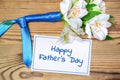 Bouquet, ribbon, card. Happy Father's Day