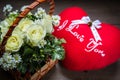 bouquet rose flower in a basket and pillow heart shape Royalty Free Stock Photo