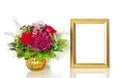 Bouquet of rose flowers and golden frame for your picture Royalty Free Stock Photo