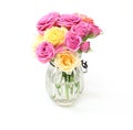 Bouquet of roses and carnation in a glass bottle Royalty Free Stock Photo