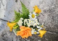 Bouquet of roses, chamomiles and daylilies. Royalty Free Stock Photo