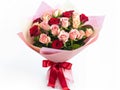 A bouquet of roses with red and pink ribbon Royalty Free Stock Photo