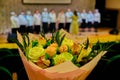 Bouquet of roses for singers and musicians. Roses for the singer of the song. Beautiful flowers for the participant of vocal