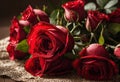 Bouquet of scarlet roses on the table