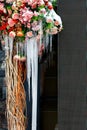 A bouquet of snow-covered flowers with ice icicles on the terrace Royalty Free Stock Photo