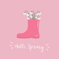 Bouquet of snowdrops in pink rubber boot. White spring flowers. Hello Spring concept