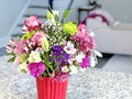 Bouquet of Spring Flowers in Red Vase Royalty Free Stock Photo