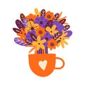 Bouquet of spring flowers in a tea cup. Floral decoration or gift. Bright flowers for a birthday, wedding, anniversary