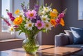 A bouquet of spring flowers in a vase on a table in the living room in the morning sun Royalty Free Stock Photo