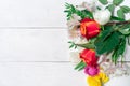 Bouquet of spring flowers on a white wooden background with place for text Royalty Free Stock Photo