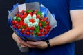 Bouquet of strawberries, blueberries and mint