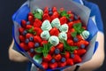 Bouquet of strawberries, blueberries and mint