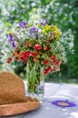 Bouquet of strawberries on the table in the garden Royalty Free Stock Photo