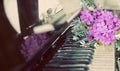 Bouquet of summer flowers on a piano