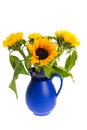 Bouquet sunflowers in blue vase Royalty Free Stock Photo