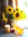 Still life with sunflowers and honey Royalty Free Stock Photo