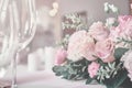 Bouquet on the table. Wine glasses in the foreground Royalty Free Stock Photo