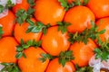 A bouquet of tangerines. The composition of the bouquet is collected from mandarins. Christmas bouquet.