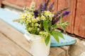 Bouquet of tea flowers. Chamomile, lemon balm and mint. Healthy diet. morning in the village. wooden background Royalty Free Stock Photo