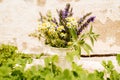 Bouquet of tea flowers. Chamomile, lemon balm and mint. Healthy diet. morning in the village. wooden background Royalty Free Stock Photo