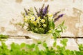 Bouquet of tea flowers. Chamomile, lemon balm and mint. Healthy diet. morning in the village. wooden background Royalty Free Stock Photo