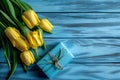 bouquet of tulips on blue backgroundyellow tulips bouquet of tulips Royalty Free Stock Photo