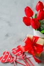 Bouquet of tulips, gift box and decorative hearts for Valentine`s, Women`s or Mother`s day Royalty Free Stock Photo