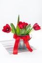 Bouquet of tulips in an iron bucket Royalty Free Stock Photo