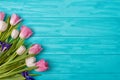 Spring background!A bouquet of tulips on a wooden background.Holiday greeting card for Valentine`s Day, Woman`s Day, Mother`s Day, Royalty Free Stock Photo