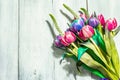 A bouquet of unusual multicolored tulips, modern hard light, dark shadow