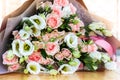 A bouquet of a variety of beautiful flowers like shrub roses and lisianthus eustoma