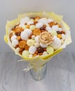 Bouquet from a variety of confectionery products such as marshmallows, biscuits, candies, chocolate, nuts