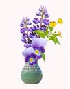 Bouquet of violet garden flowers in the earthenware vase Royalty Free Stock Photo