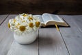 Bouquet of white daisies and bible Royalty Free Stock Photo