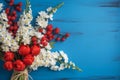 a bouquet of white daisies, red wildflowers, on a blue wooden background generated by AI, generative assistant Royalty Free Stock Photo