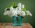 Bouquet of white lilac, flowers in a glass vase.
