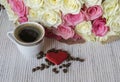 Bouquet of white and pink roses. Cup of coffee and heart. Royalty Free Stock Photo