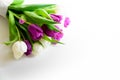 Bouquet of white and purple tulips on white wooden background. Top view. Flat lay. Copy space. Valentines day, mothers day, Royalty Free Stock Photo