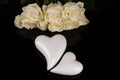 A bouquet of white roses, angels of love and porcelain hearts, Valentine`s Day