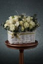 Bouquet with white roses and decorative straw Royalty Free Stock Photo